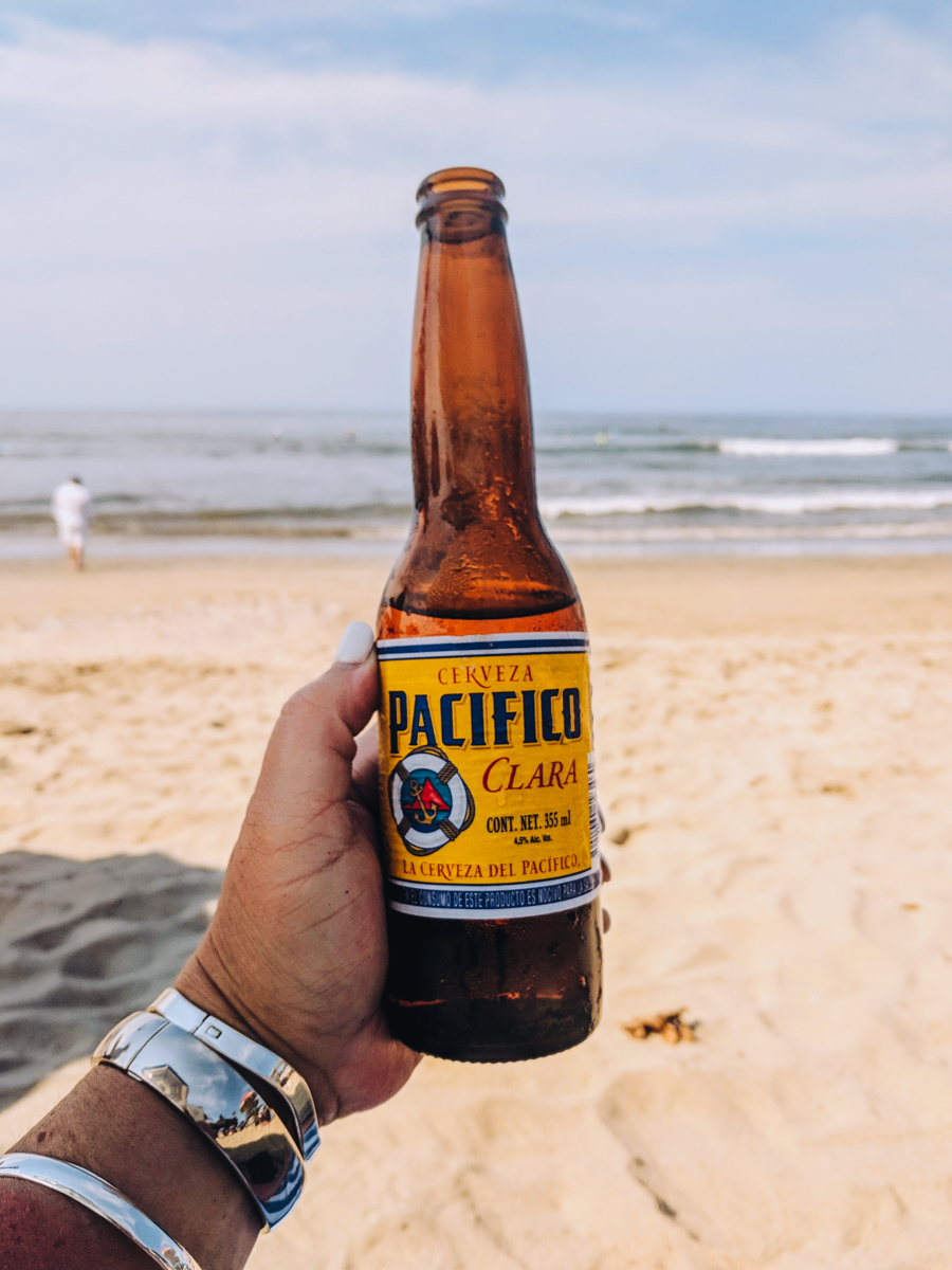 a Pacifico Beer on the beach while in Sayulita