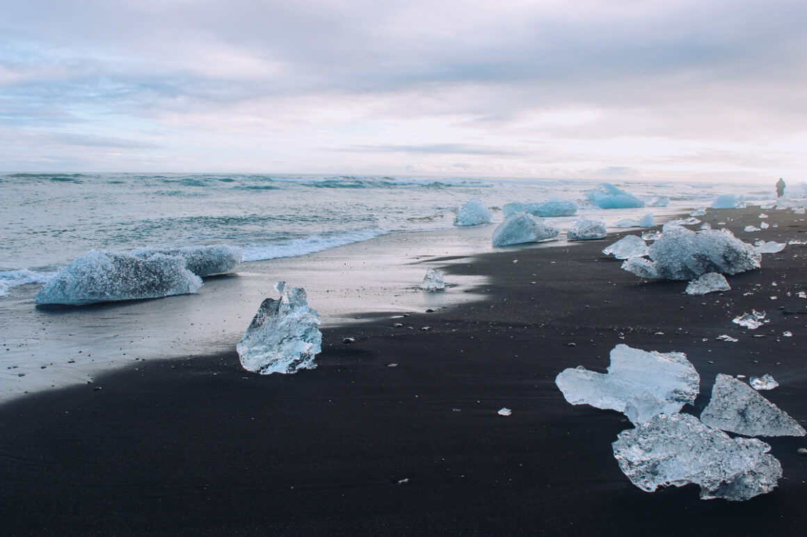 pieces of icebergs on the black sand beach of Breiðamerkursandur