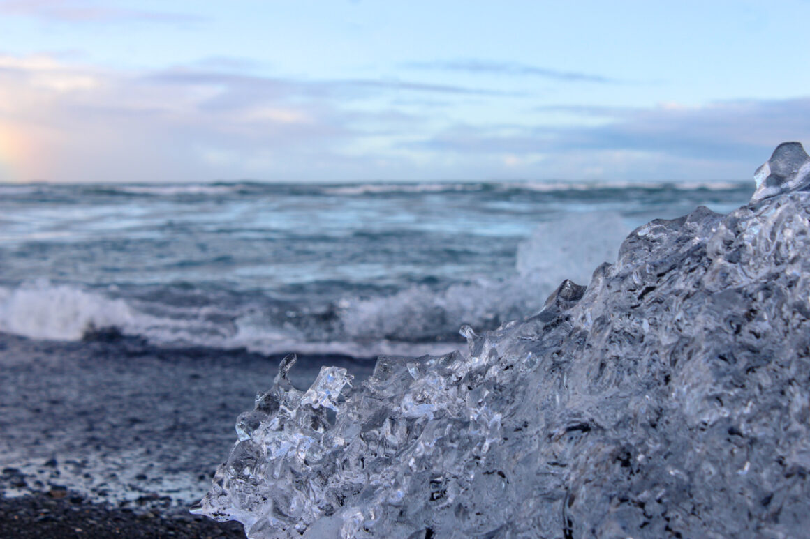 pieces of icebergs on the black sand beach of Breiðamerkursandur in Iceland