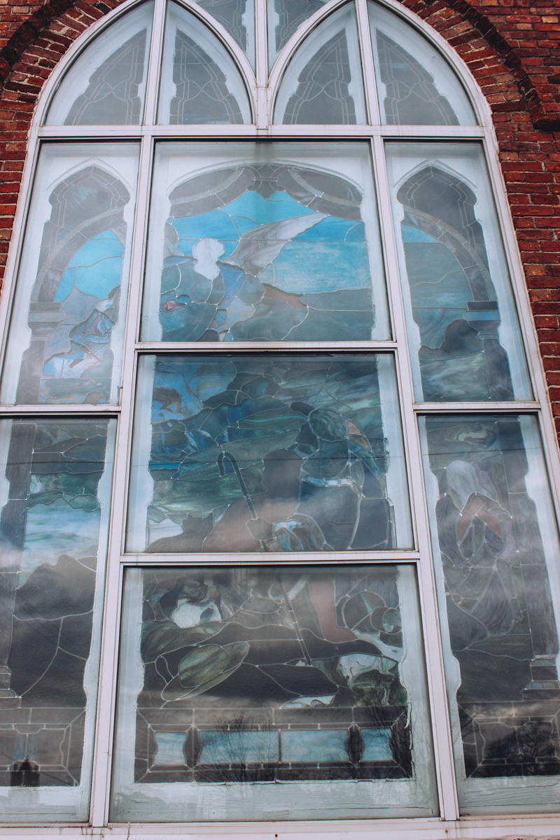 Stained glass of the old church where the Red Door Theater performs in Union Springs, AL
