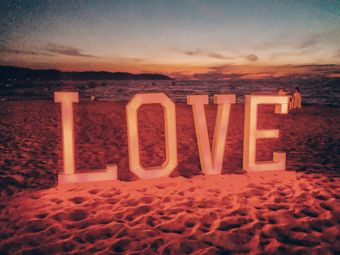 The letters LOVE in the sand at the beach in Puerto Vallarta