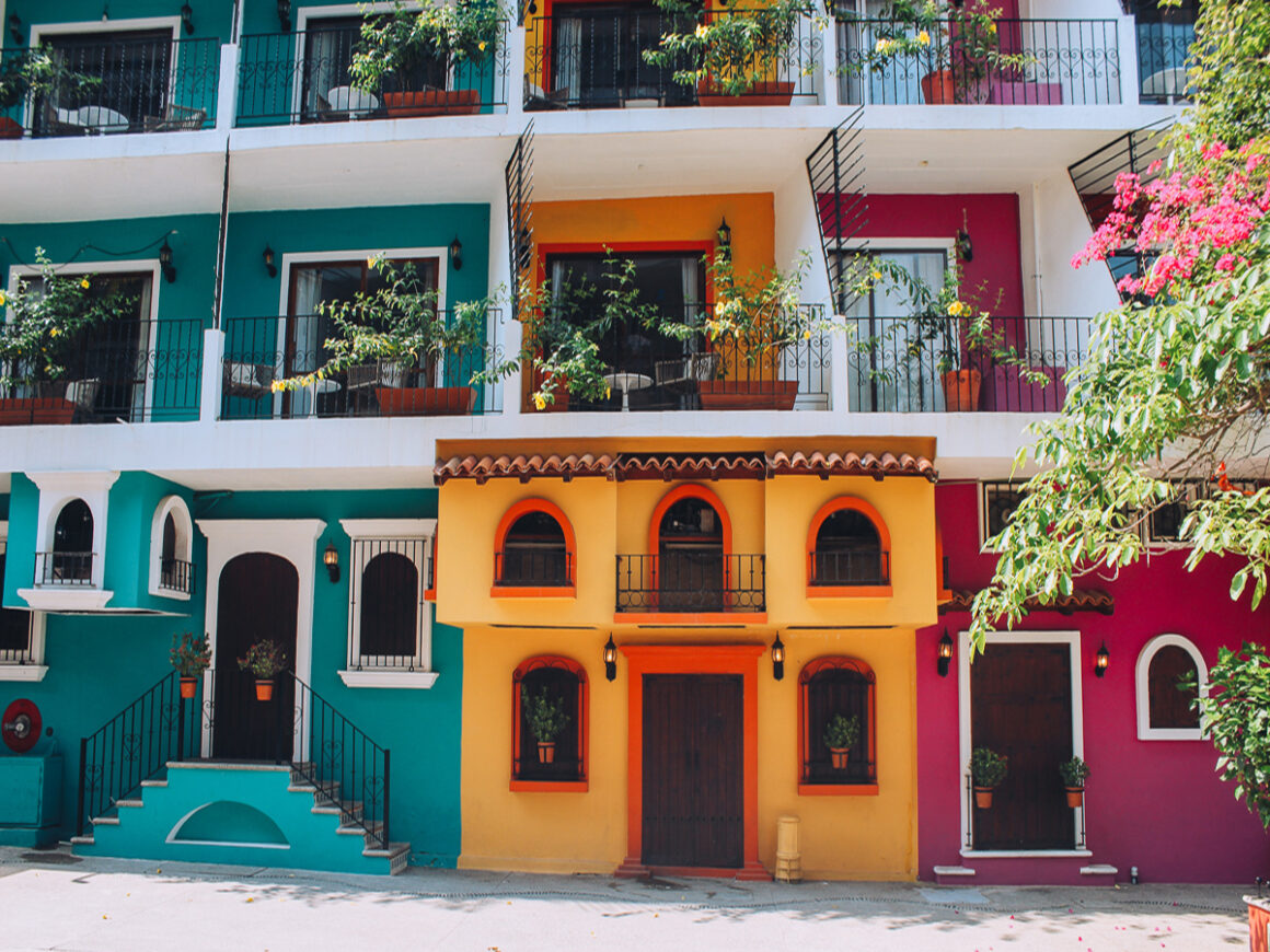 the colorful outside of hotel los Arcos in Puerto Vallarta