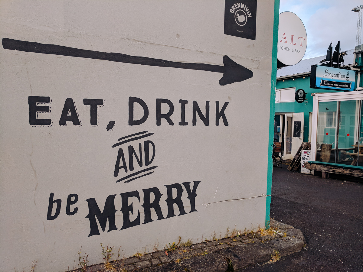 mural that says eat drink and be merry one of the best things to do in Reykjavik