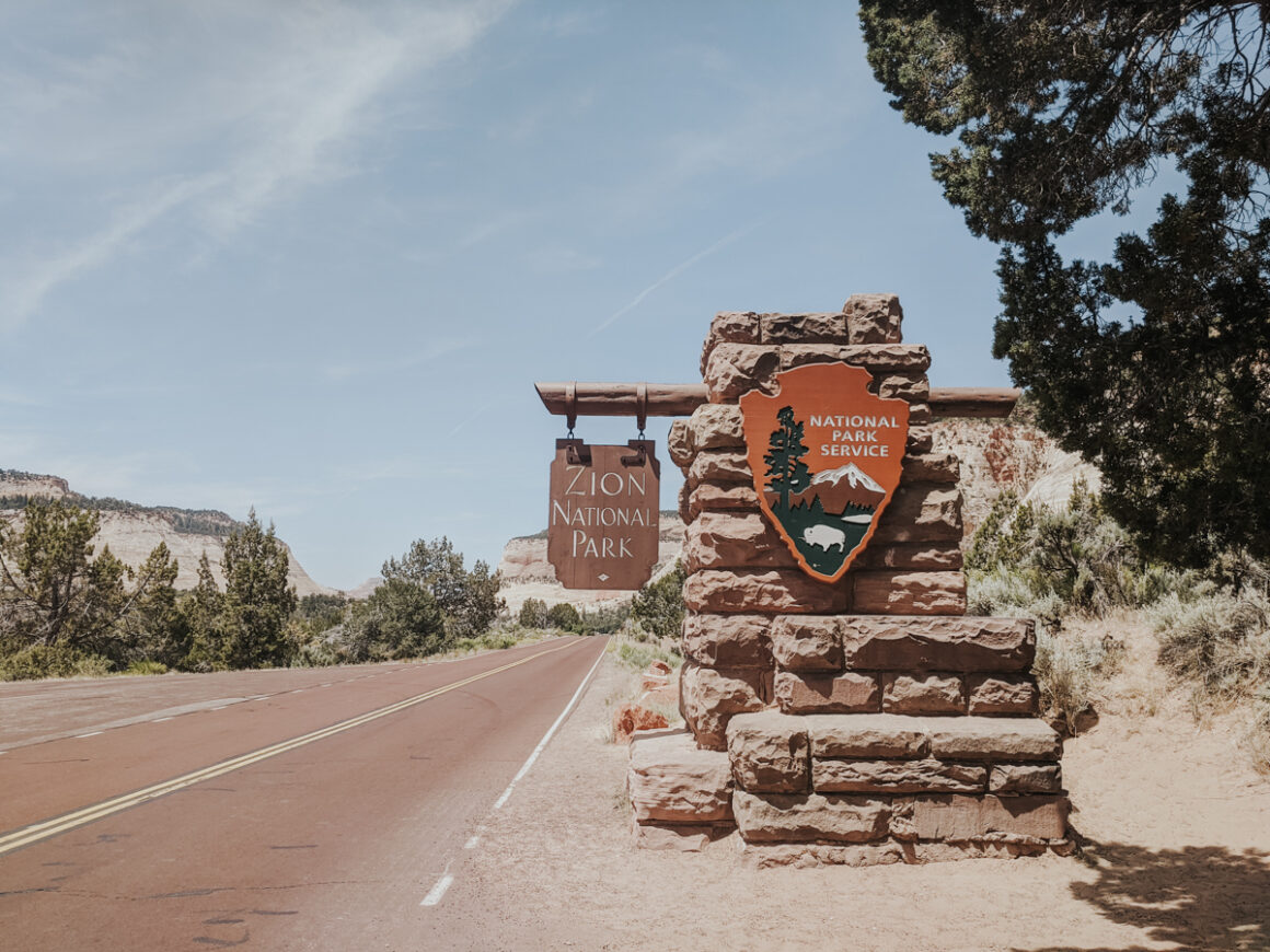 Zion National Park sign on a Las Vegas to Zion National Park road trip