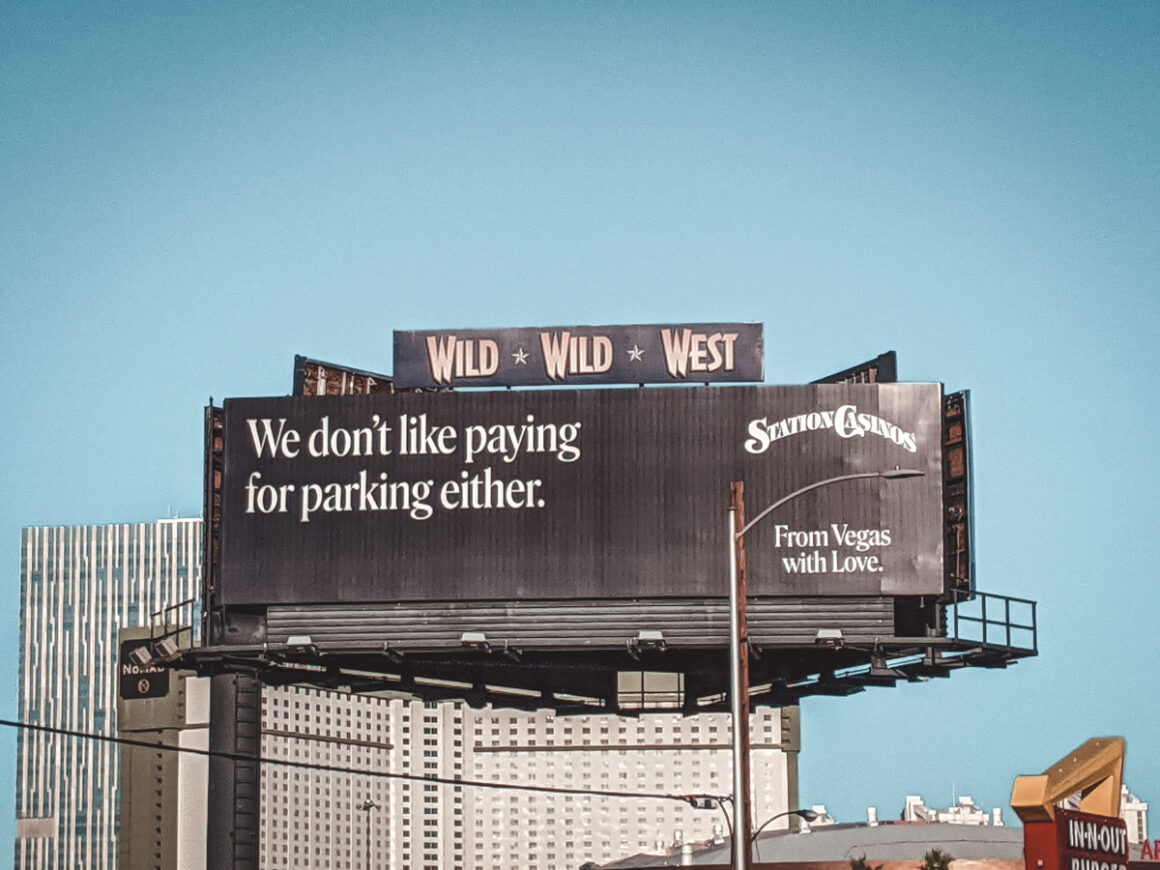 billboard sign in Las Vegas that says we don't like paying for parking either