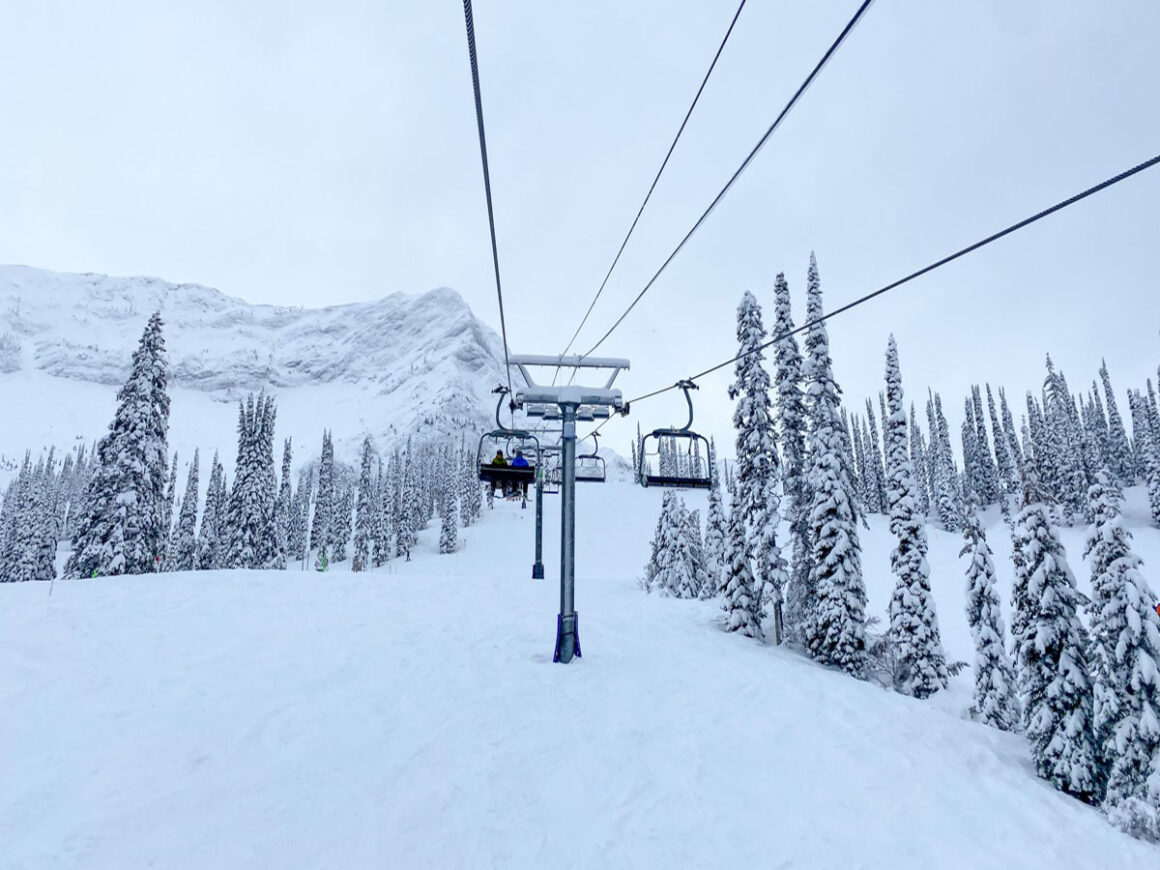 A ski lift in the snow covered Canadian Rockies 