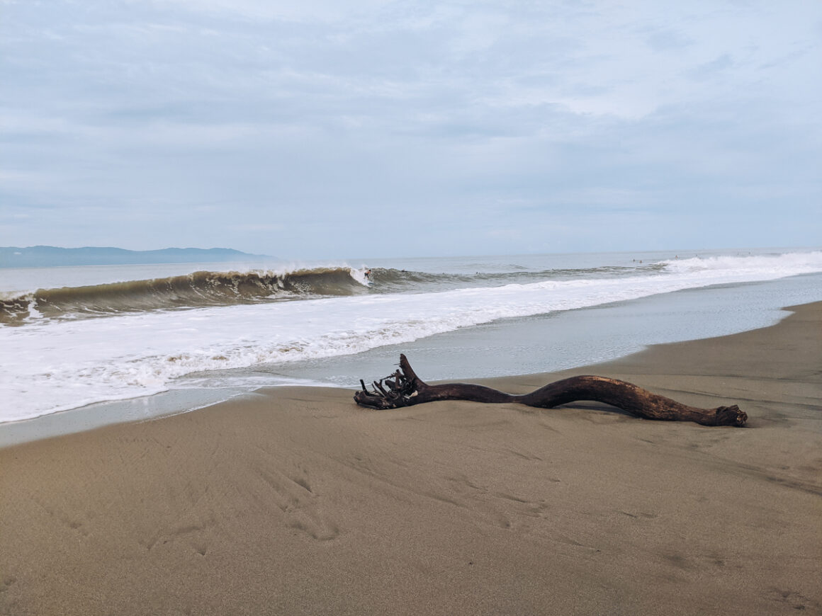 Big waves and a surfer in the Pacific Ocean near Puerto Vallarta