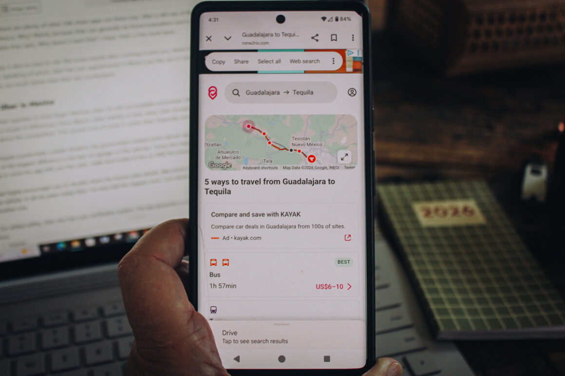 Rome2Rio App on a phone - one of the best apps for traveling in Mexico