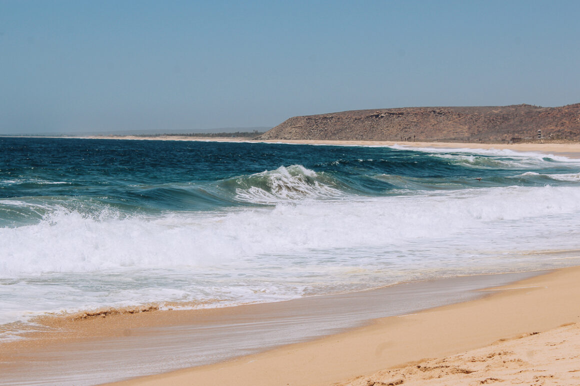 A beautiful blue ocean and golden sand in Baja Sur Mexico